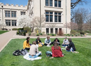 Professor teaches class outdoors.