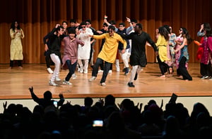 Students performing on stage